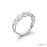 JB Star Platinum Wedding Band with Round Brilliant and Baguette Cut Diamonds