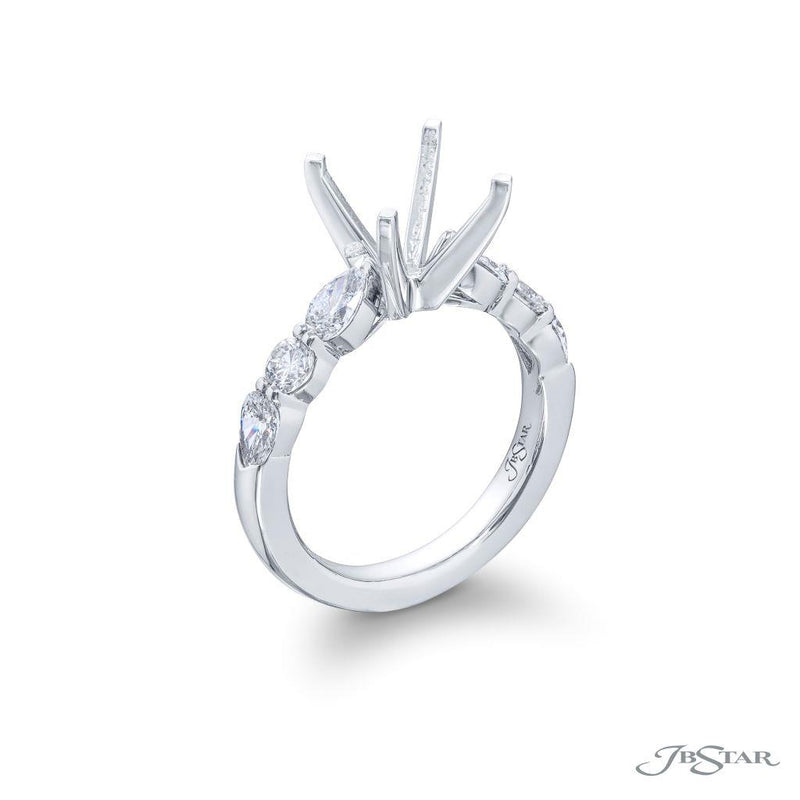 JB Star Platinum Engagement Ring with Pear Shape and Round Brilliant Cut Diamonds