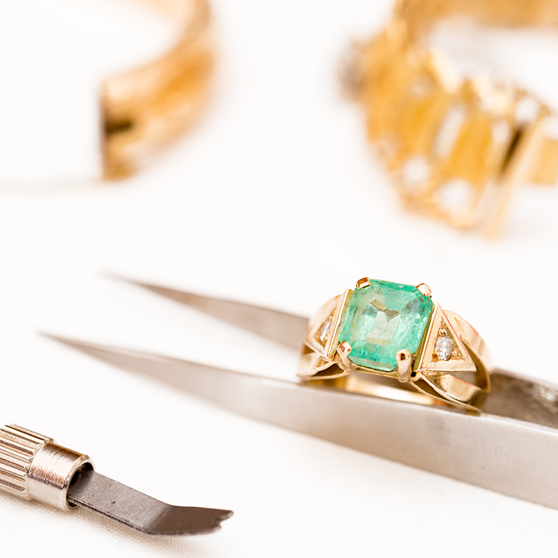 Assorted jewelry tools & gold gem ring